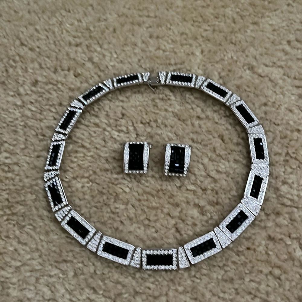 Black and rhinestone choker and clip on earrings.